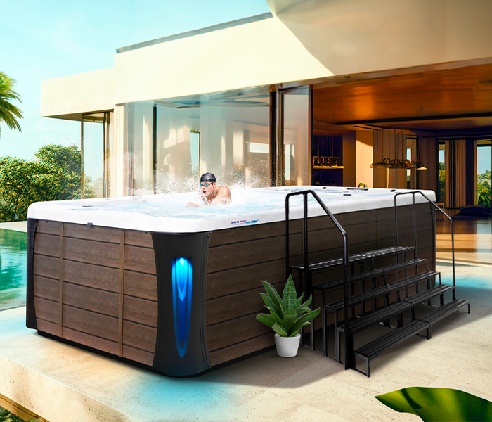 Calspas hot tub being used in a family setting - Orange